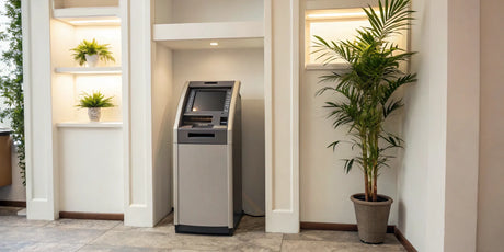 An ATM placed in a prime indoor business location for high foot traffic and visibility.